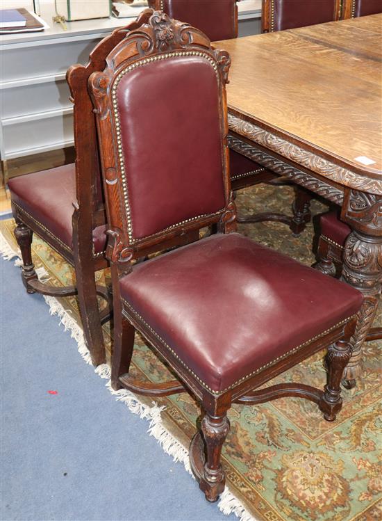 A set of ten late Victorian carved oak dining chairs